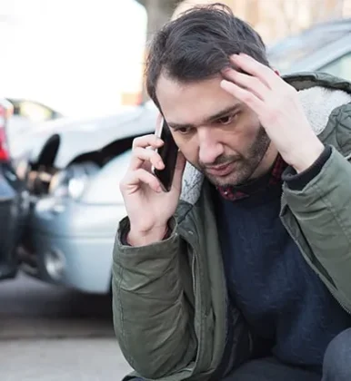 Man calling 911 asking for help after car accident