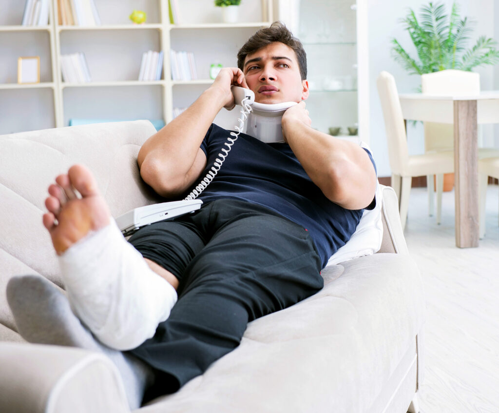 when-should-i-call-a-personal-injury-lawyer-after-an-accident-if-im-hurt-guy-injured-on-couch