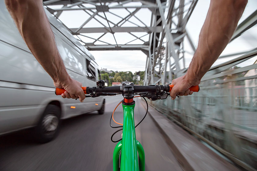 bicyclist-staying-on-the-rightmost-side-of-the-road