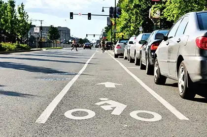 marked bike lane highlighting enforcement measures that protect cyclists from injury