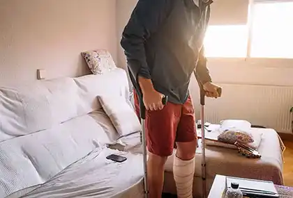man with fractured leg after falling down the stairs