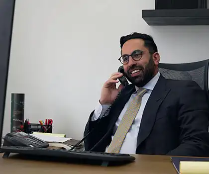 AK lawyer on the phone with a restaurant slip and fall accident victim