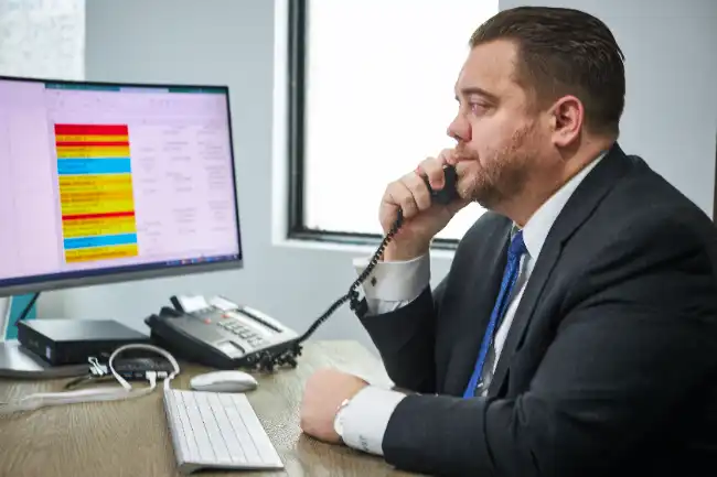 A personal injury lawyer in Chula Vista speaking to a client over the phone