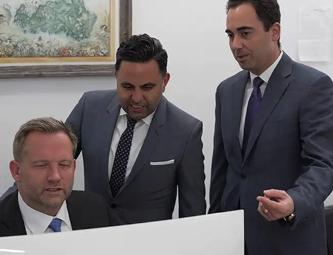 Arash Law car accident lawyers looking at a case in Mono County