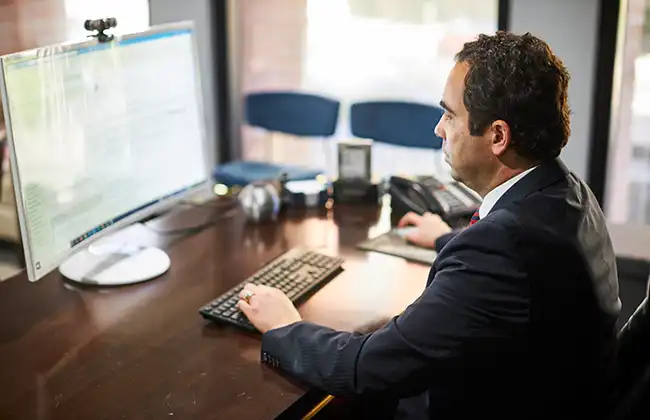 Personal injury lawyer in Buena Park answering client questions online