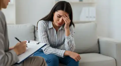 Survivor talking about their experience in a therapy session