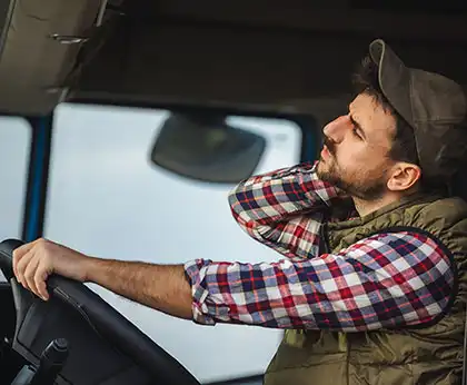 fatigued big-rig truck driver after a long haul