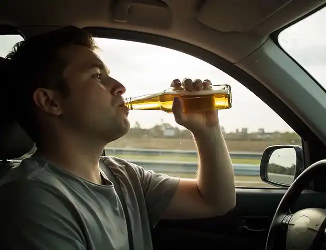 Driver drinking alcohol while driving in Elk Grove