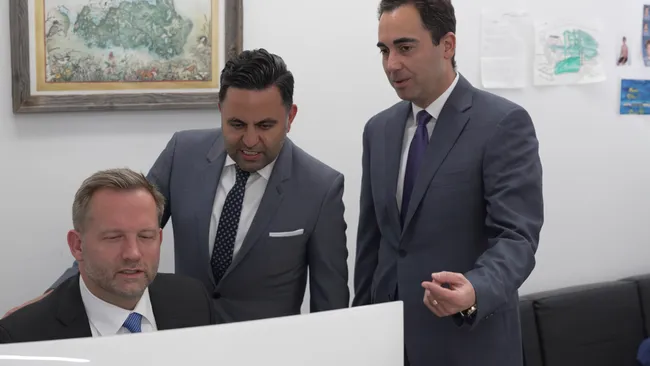 AK Lawyers reviewing the car accident case in Clovis