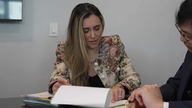 AK lawyers discussing a Lyft accident case in Palmdale