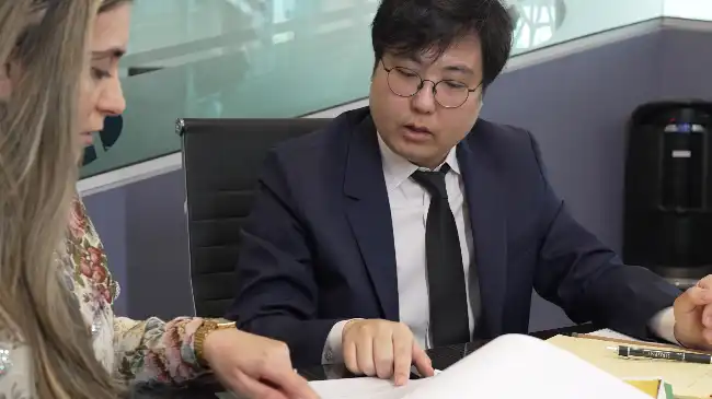 AK lawyers discussing a pedestrian accident case in Long Beach