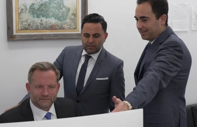 Elk Grove Lyft accident lawyers reviewing a case together in the office