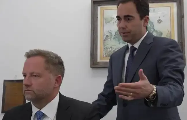 Personal injury lawyer explaining a case to a colleague