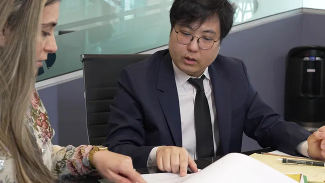 Two AK lawyers discussing the car accident case in Simi Valley