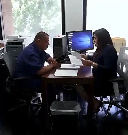 a client consulting a lawyer from Arash Law for his rear-end collision accident