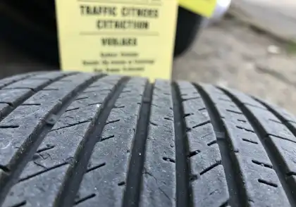 Worn tire tread showing unsafe depth under California law