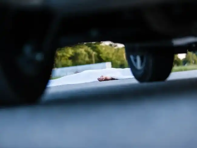 Hit-and-Run accident victim lying on the ground