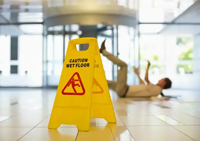Man had a Slip-And-Fall accident despite warning sign