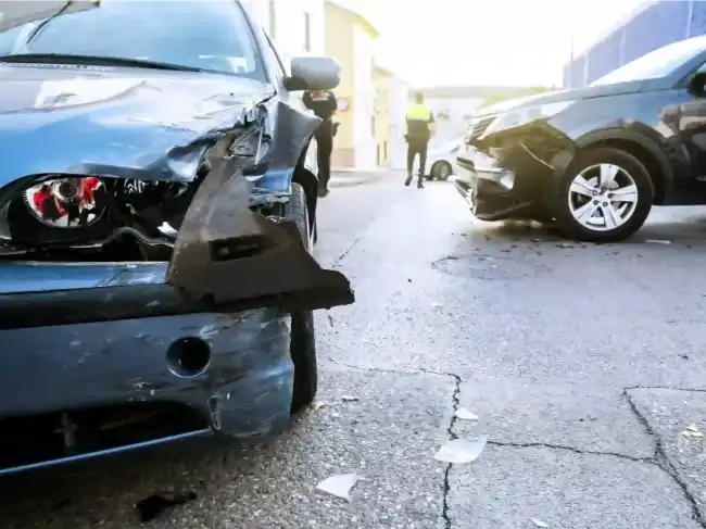 Personal injury accident showing two cars collided on the road