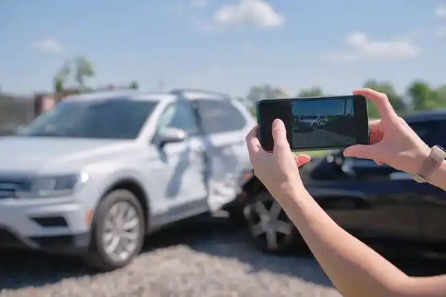 Personal injury victim taking pictures for evidence