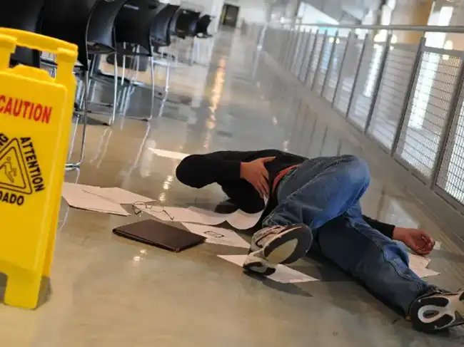 Slip-And-Fall accident victim lying on the ground