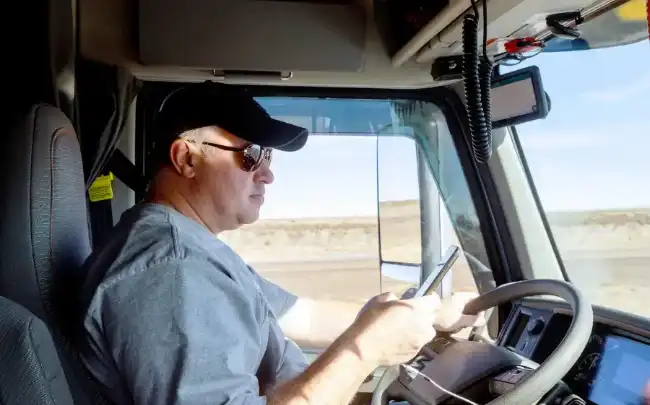 Truck accident risks with driver using mobile phone while driving