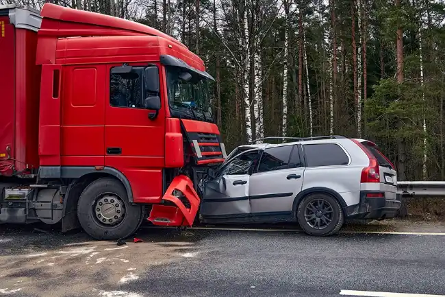 Truck accident scene after car head-on collision