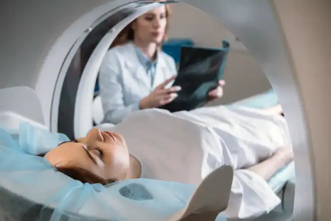 Truck accident victim being scanned in the hospital