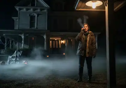 Haunted house property owner calling for help on the phone