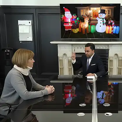 a woman consulting a lawyer after being injured in a holiday yard decoration
