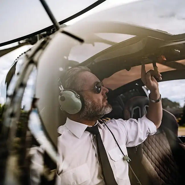 pilot starting the helicopter