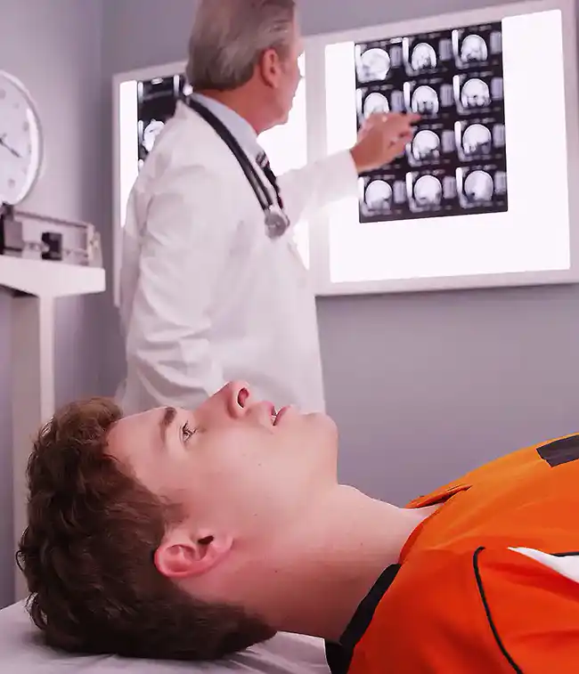 sports player having a checkup after a catastrophic injury