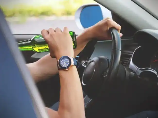 DUI accident risks with driver drinking alcohol while driving