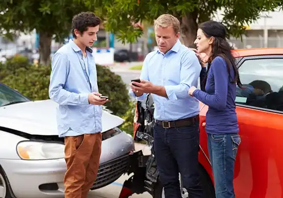 Drivers exchanging information at the scene of a California car accident