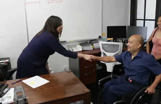 Lawyer meeting with injured client for hit-and-run accident claim