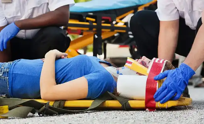 Pedestrian accident victim being placed on stretcher