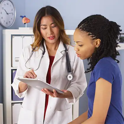 Personal injury victim discussing results with the doctor