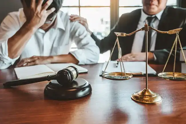 Uber accident victim discussing case with lawyer