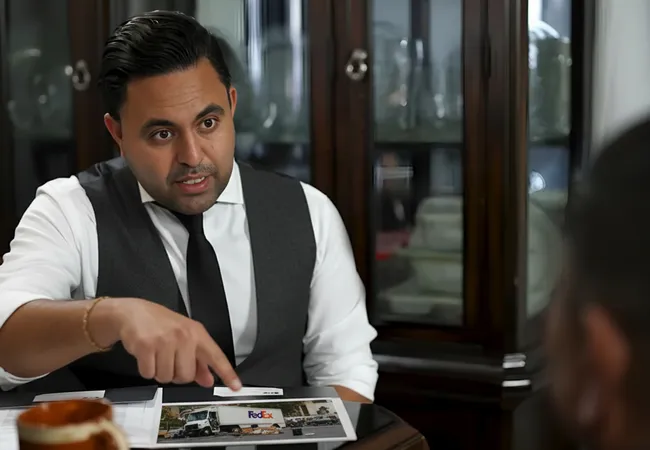 AK lawyer is discussing with a client involved in a FedEx truck accident case