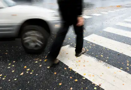 Pedestrian struck near an unofficial crosswalk highlighting shared fault in injury claims
