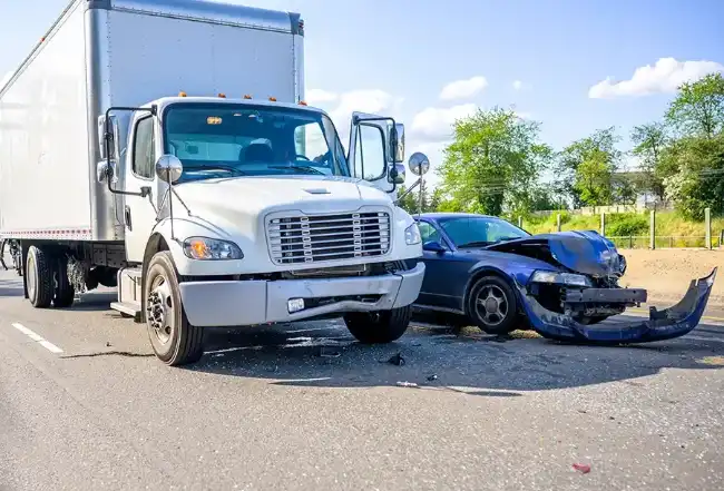 Truck accident scene involving a car in Del Norte County