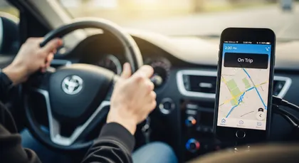 Close-up of rideshare navigation screen during active trip