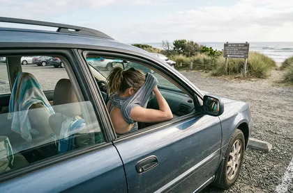 Person changing clothes in a parked car in Fenwick Island