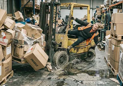 Forklift accident caused by unsafe warehouse flooring and clutter