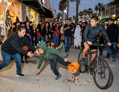 Child injured in a Halloween bicycle accident while trick-or-treating in California